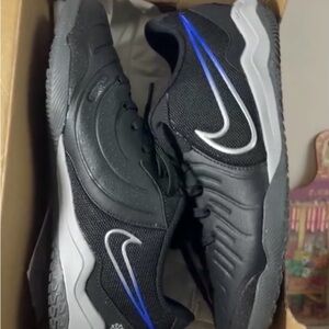 Nike Black and Silver Athletic Shoes with Blue Accents